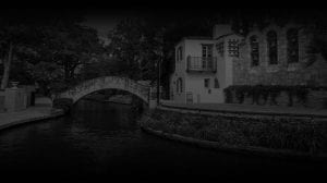Black and White image of bridge over river